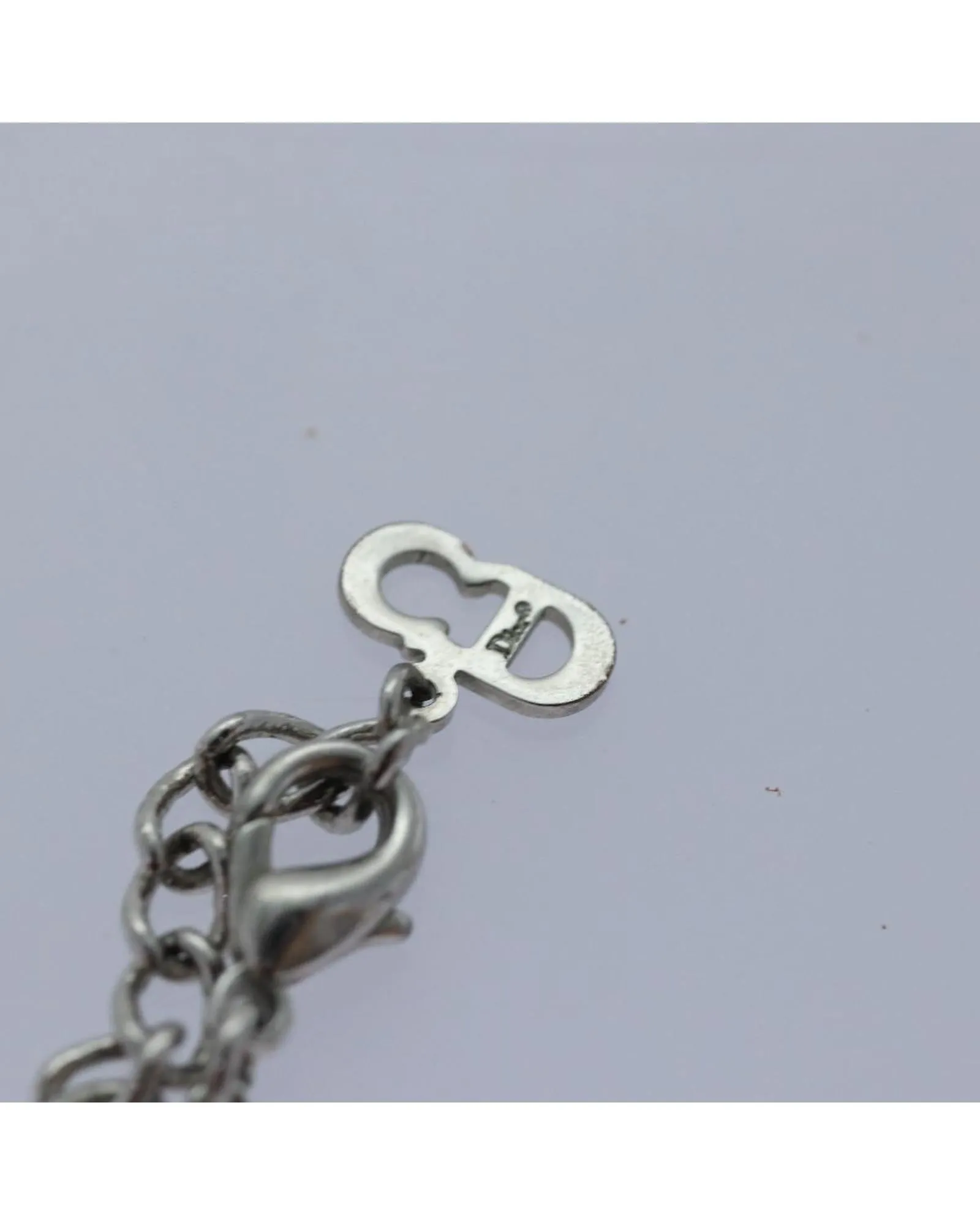 Elegant Metal Bracelet with Item Box and Subtle Scratches