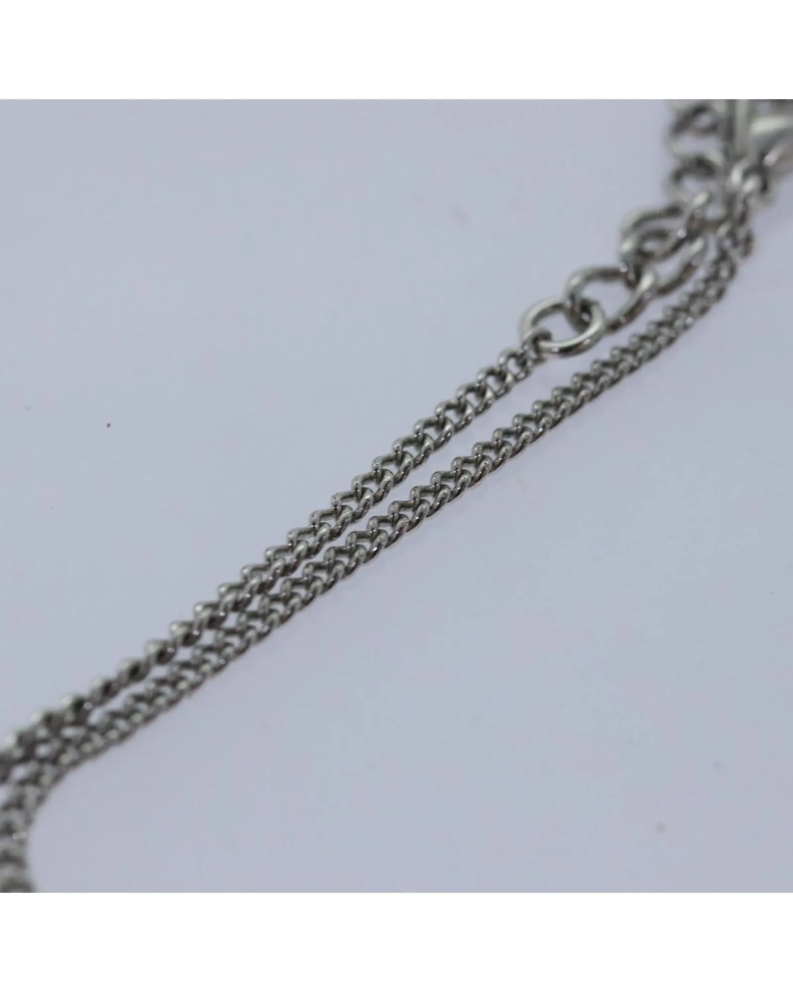 Elegant Metal Bracelet with Item Box and Subtle Scratches