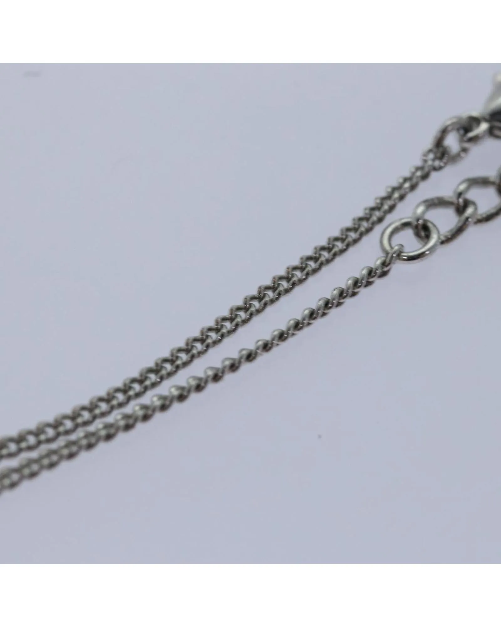 Elegant Metal Bracelet with Item Box and Subtle Scratches